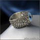 Кольцо глаз сибирской хаски с дизайнерской шинкой в форме крыльев Ангела