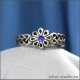 Женское кольцо с синим камнем фианитом и славянской звездой Алатырь