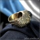 Ювелирное кольцо с глазом снежного барса в золотых крыльях ангела