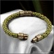 женский браслет шнур ярко зеленого цвета с золотыми шармами