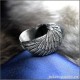 Ювелирное кольцо с глазом снежного барса в серебряных крыльях ангела