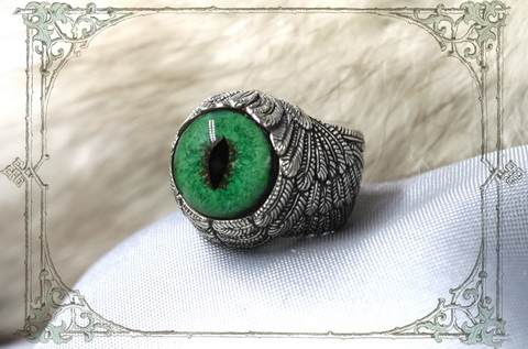 кольцо крылья ангела с зеленым глазом нибелунга