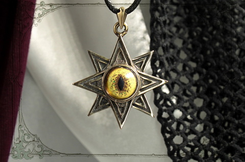 кулон золотая звезда Иштар с глазом росомахи